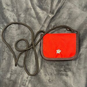 Red Crossbody Bag with Floral Accent